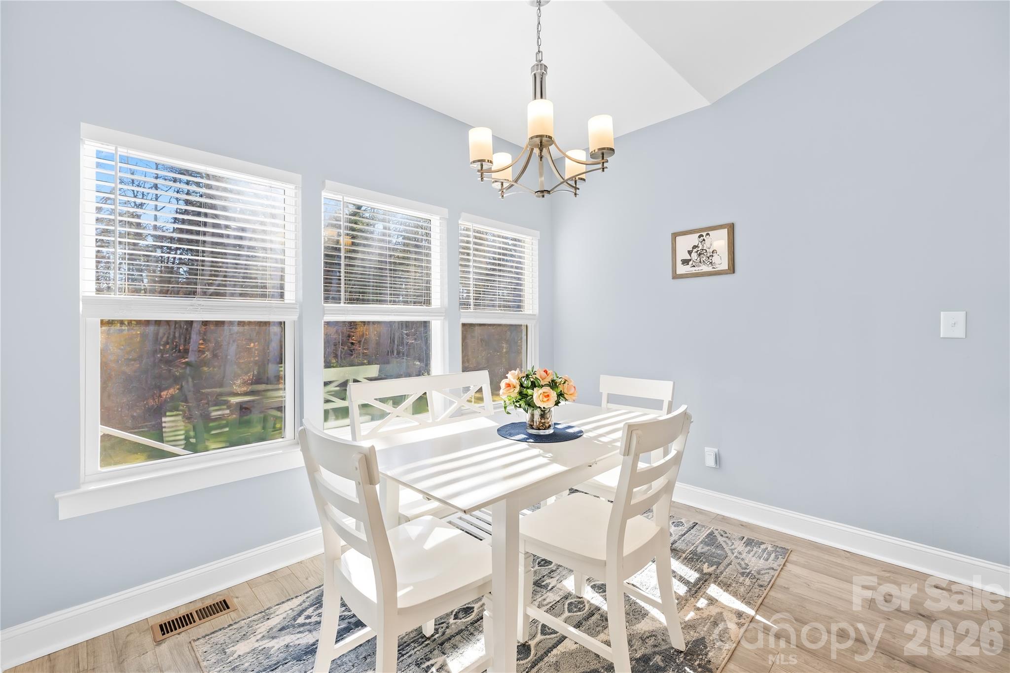 1600 Barefoot Road Catawba, NC 28609 - Photo 16 of 34 a view of a dining room with furniture a chandelier and wooden floor
