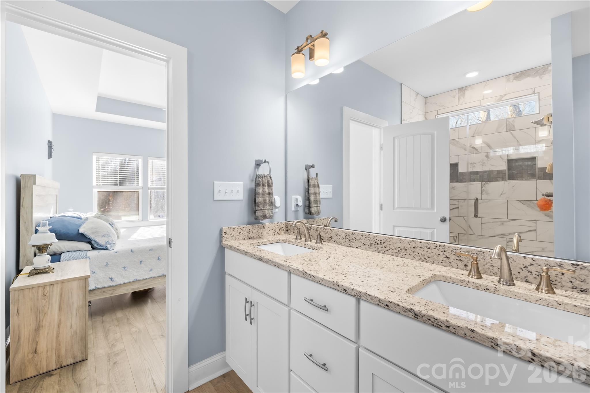 1600 Barefoot Road Catawba, NC 28609 - Photo 19 of 34 a en suite bathroom with a granite countertop sink and a mirror