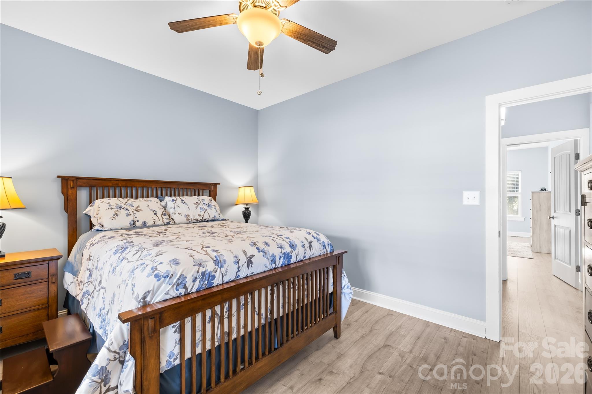 1600 Barefoot Road Catawba, NC 28609 - Photo 21 of 34 a bedroom with a bed and a chandelier