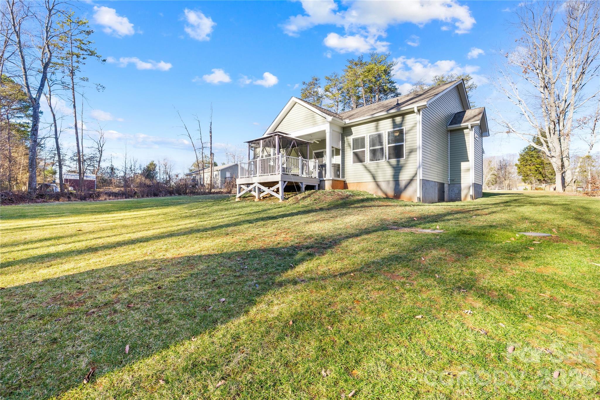 1600 Barefoot Road Catawba, NC 28609 - Photo 28 of 34 a view of a house with a big yard and large trees