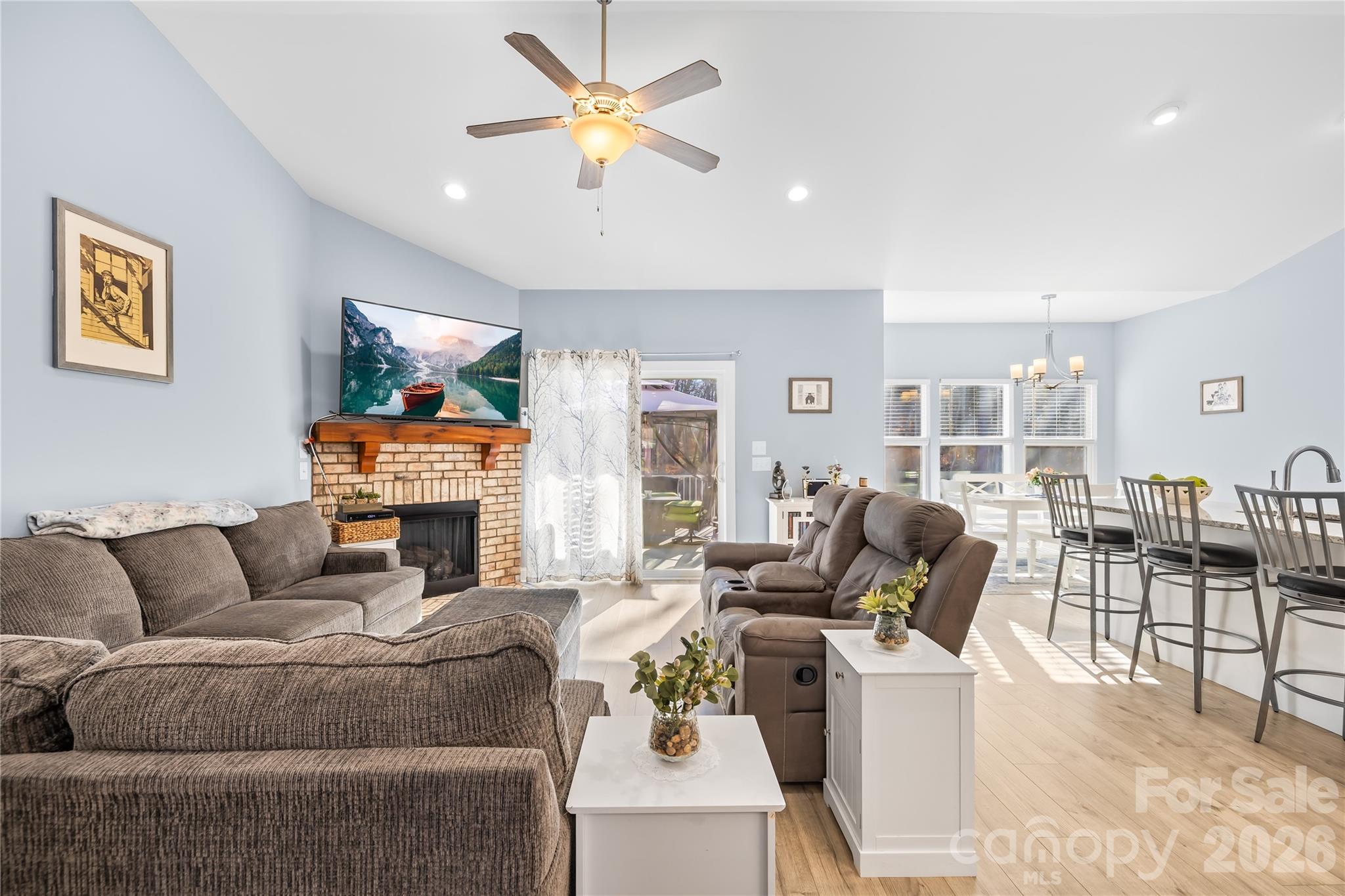 1600 Barefoot Road Catawba, NC 28609 - Photo 6 of 34 a living room with furniture a fireplace and a flat screen tv