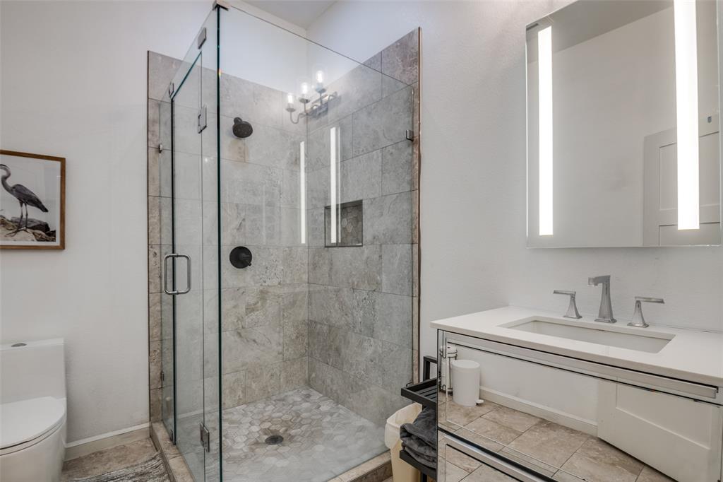 107 Slaughter Ranch Road Trinidad, TX 75163 - Photo 11 of 12 a bathroom with a shower a toilet and a sink