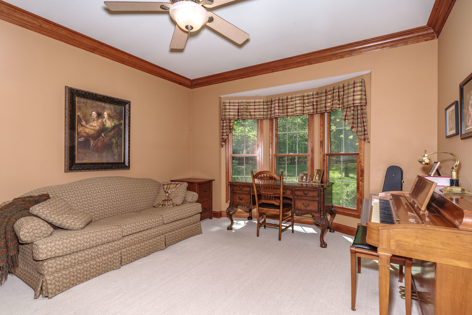 21221 Hidden Valley Loop Lexington, IL 61753 - Photo 13 of 44 a living room with furniture and a large window