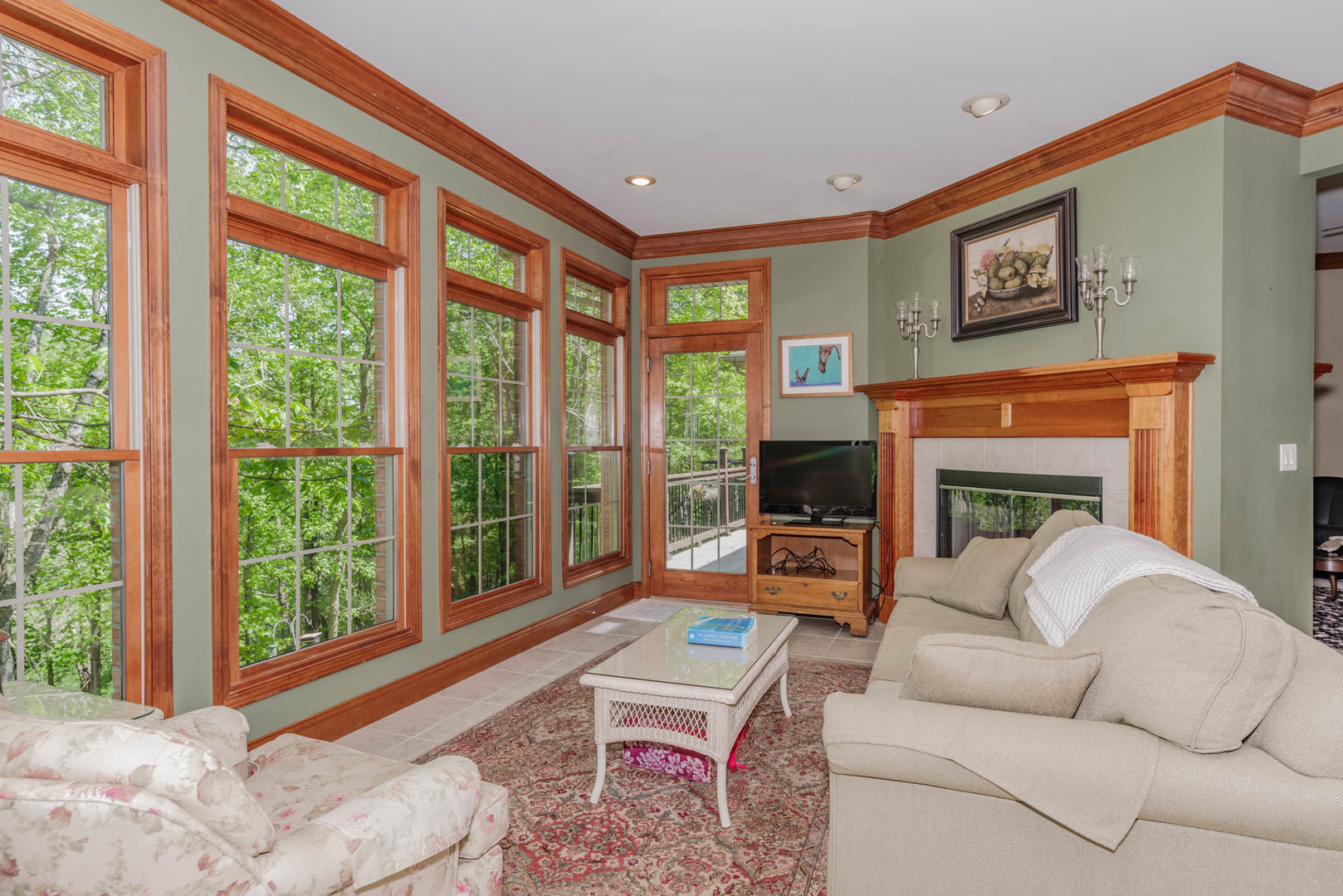 21221 Hidden Valley Loop Lexington, IL 61753 - Photo 20 of 44 a living room with furniture a fireplace and a large window