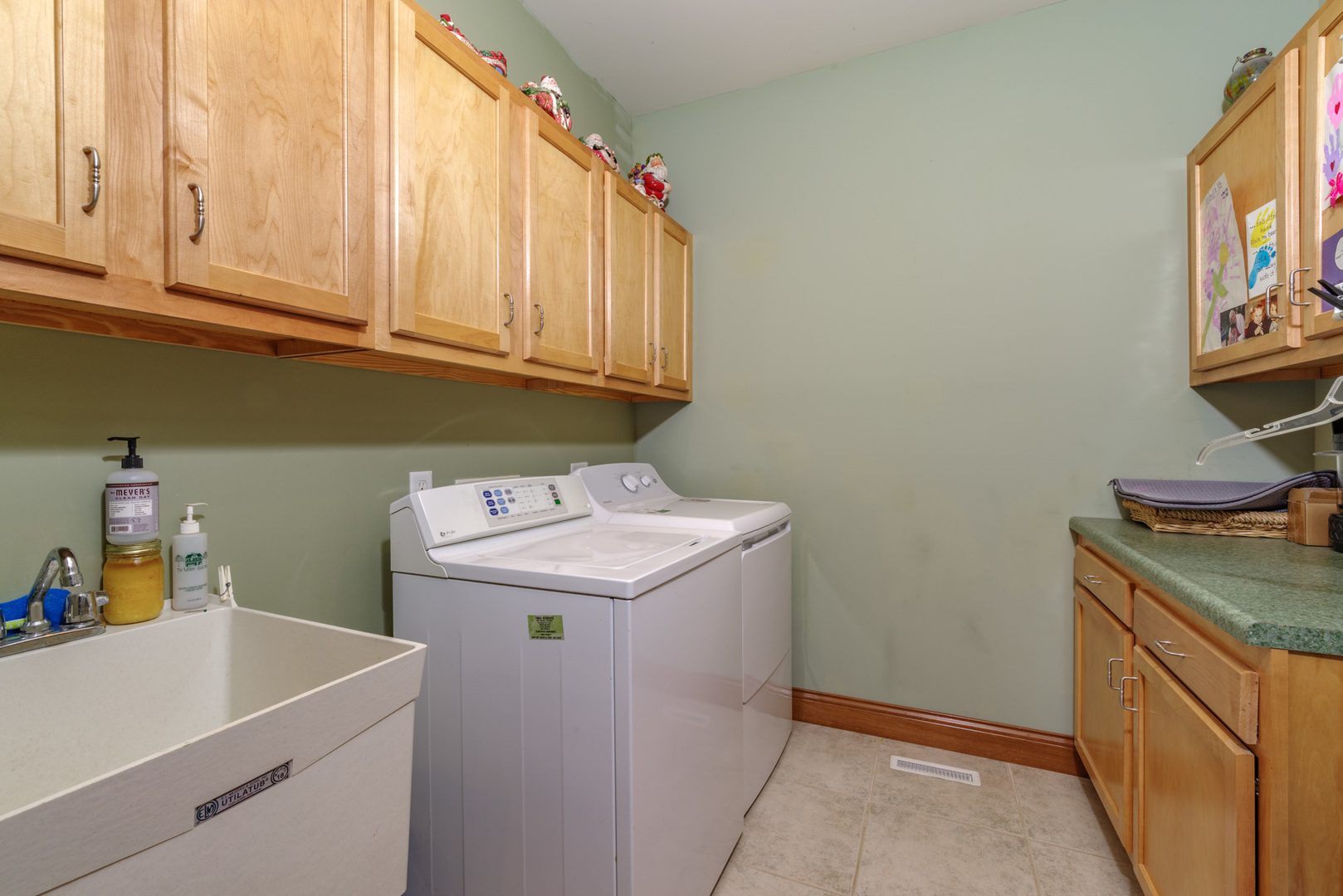 21221 Hidden Valley Loop Lexington, IL 61753 - Photo 22 of 44 a utility room with dryer and washer