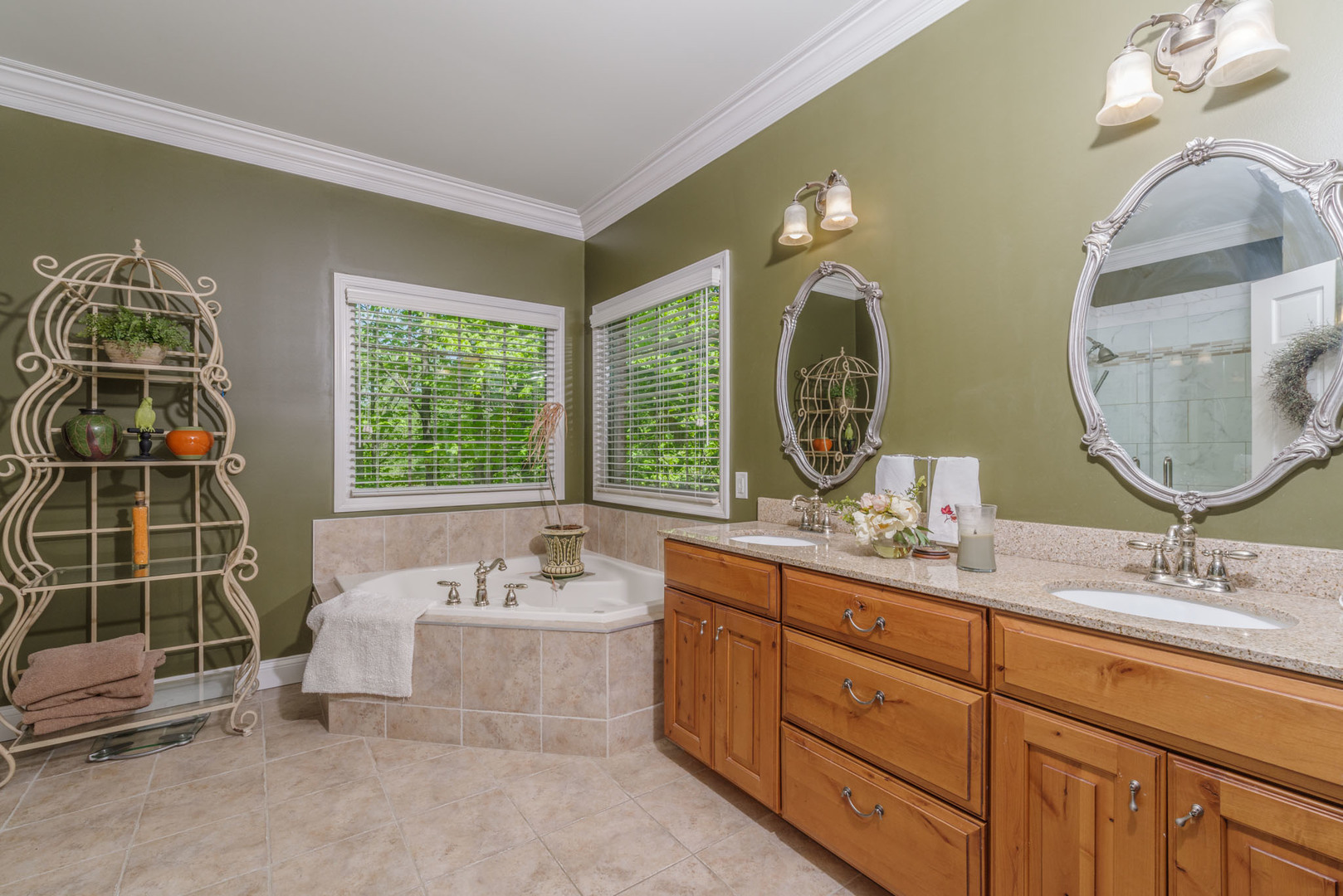 21221 Hidden Valley Loop Lexington, IL 61753 - Photo 27 of 44 a bathroom with a double vanity sink and a mirror