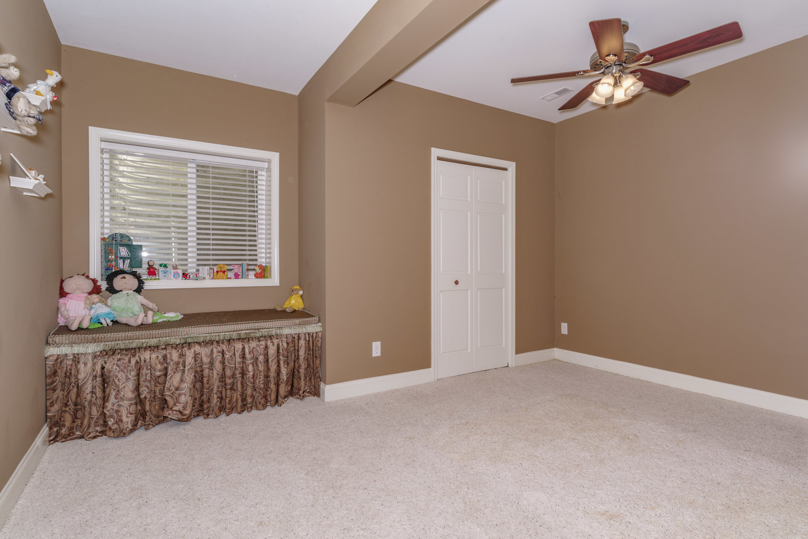 21221 Hidden Valley Loop Lexington, IL 61753 - Photo 37 of 44 a view of a livingroom with a ceiling fan and window