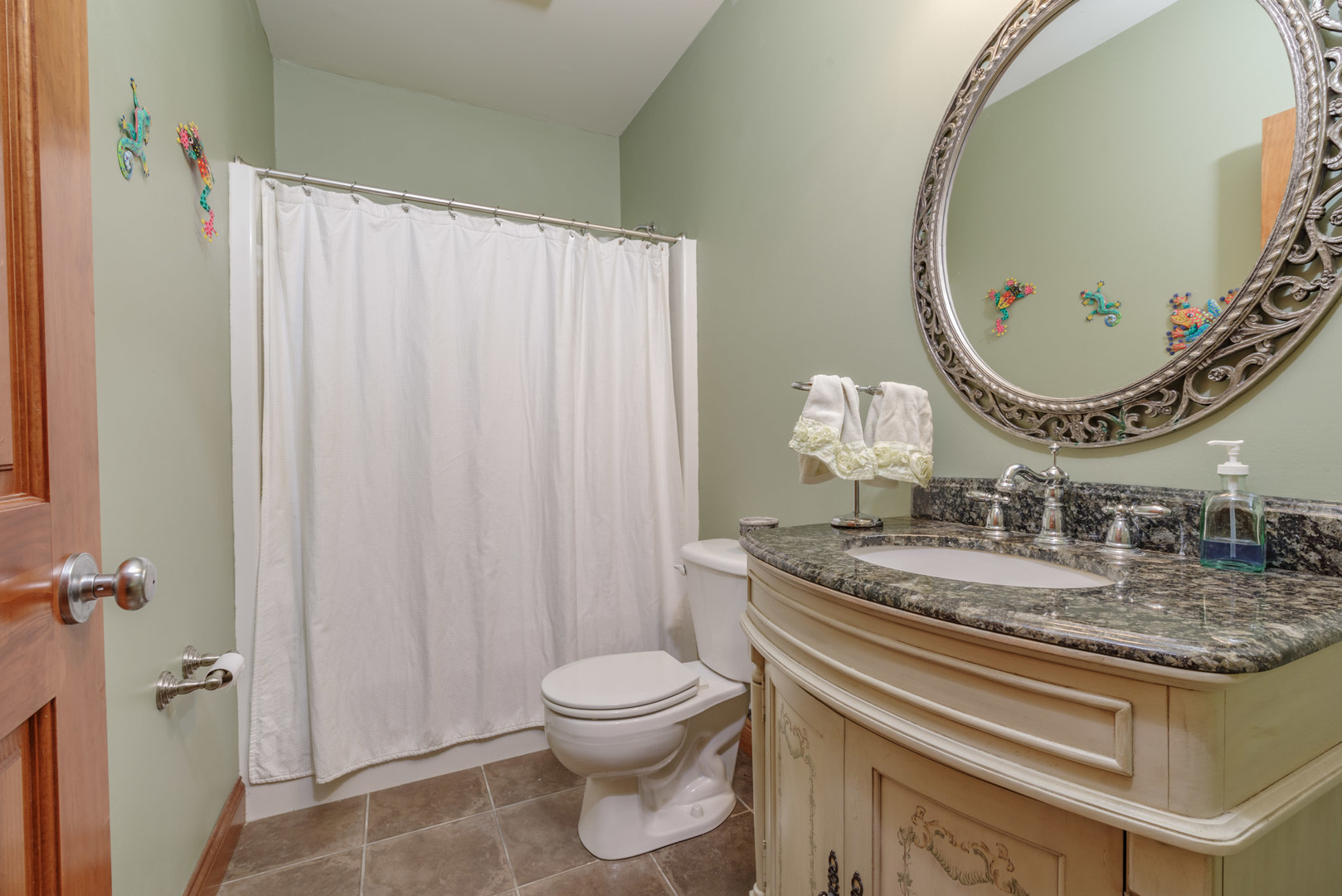 21221 Hidden Valley Loop Lexington, IL 61753 - Photo 38 of 44 a bathroom with a granite countertop sink mirror vanity and toilet