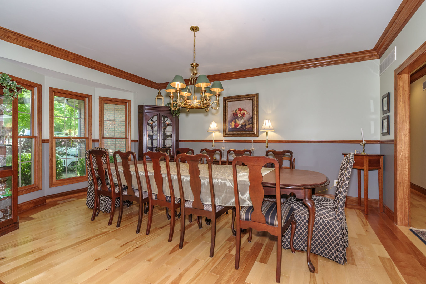 21221 Hidden Valley Loop Lexington, IL 61753 - Photo 7 of 44 a view of a dining room with furniture window and wooden floor