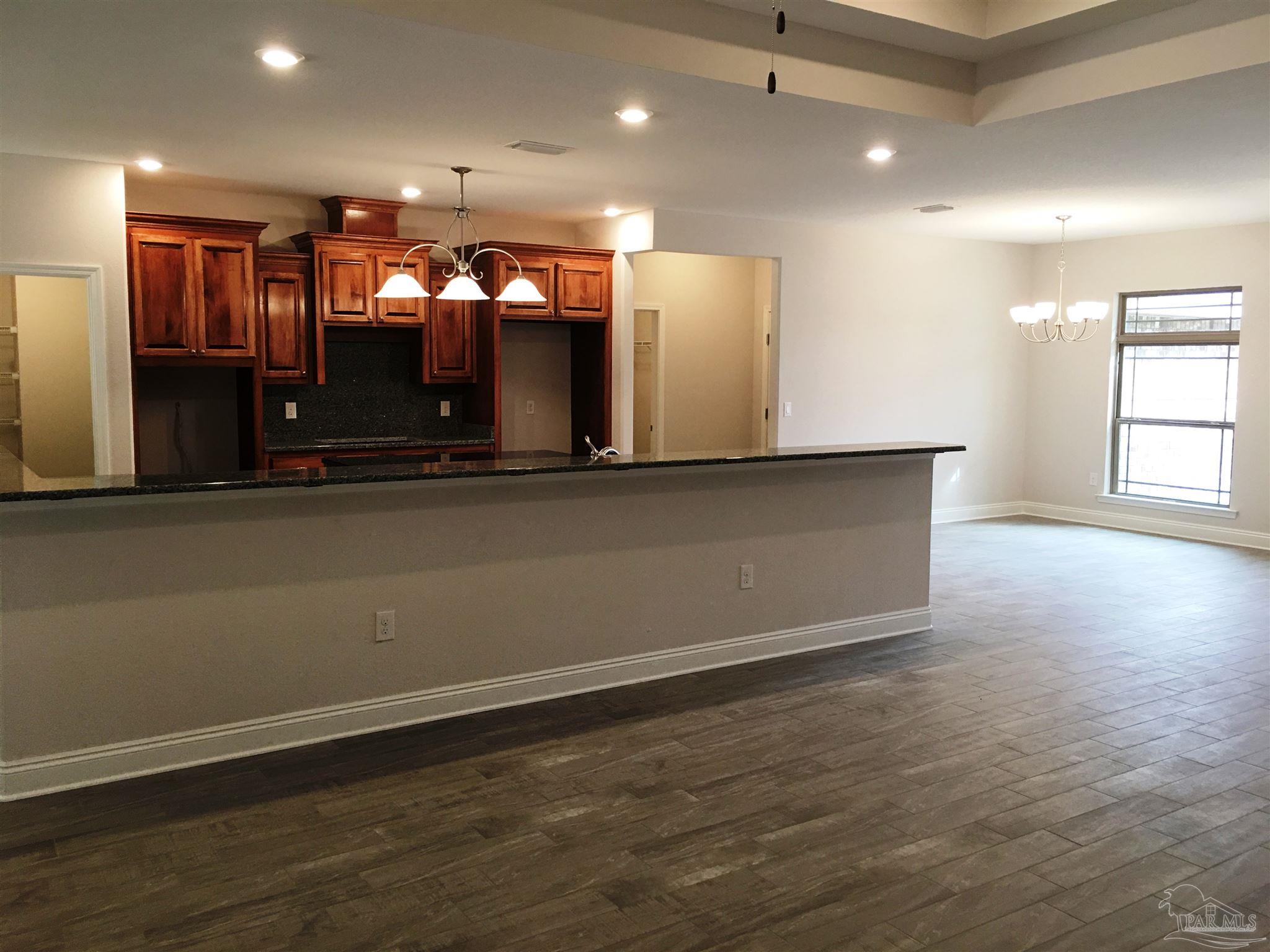 5436 South A Jones Road Milton, FL 32583 - Photo 21 of 34 A view from living to dining room is seen here.