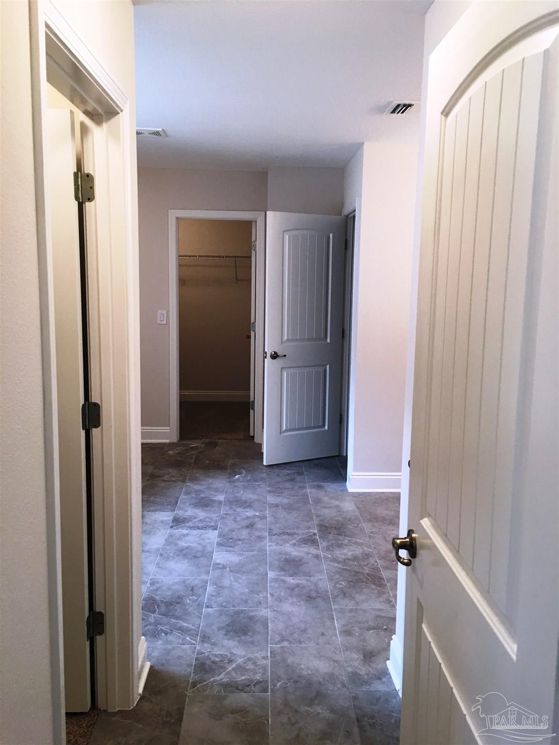 5436 South A Jones Road Milton, FL 32583 - Photo 23 of 34 A view of the master bath entry is seen here.