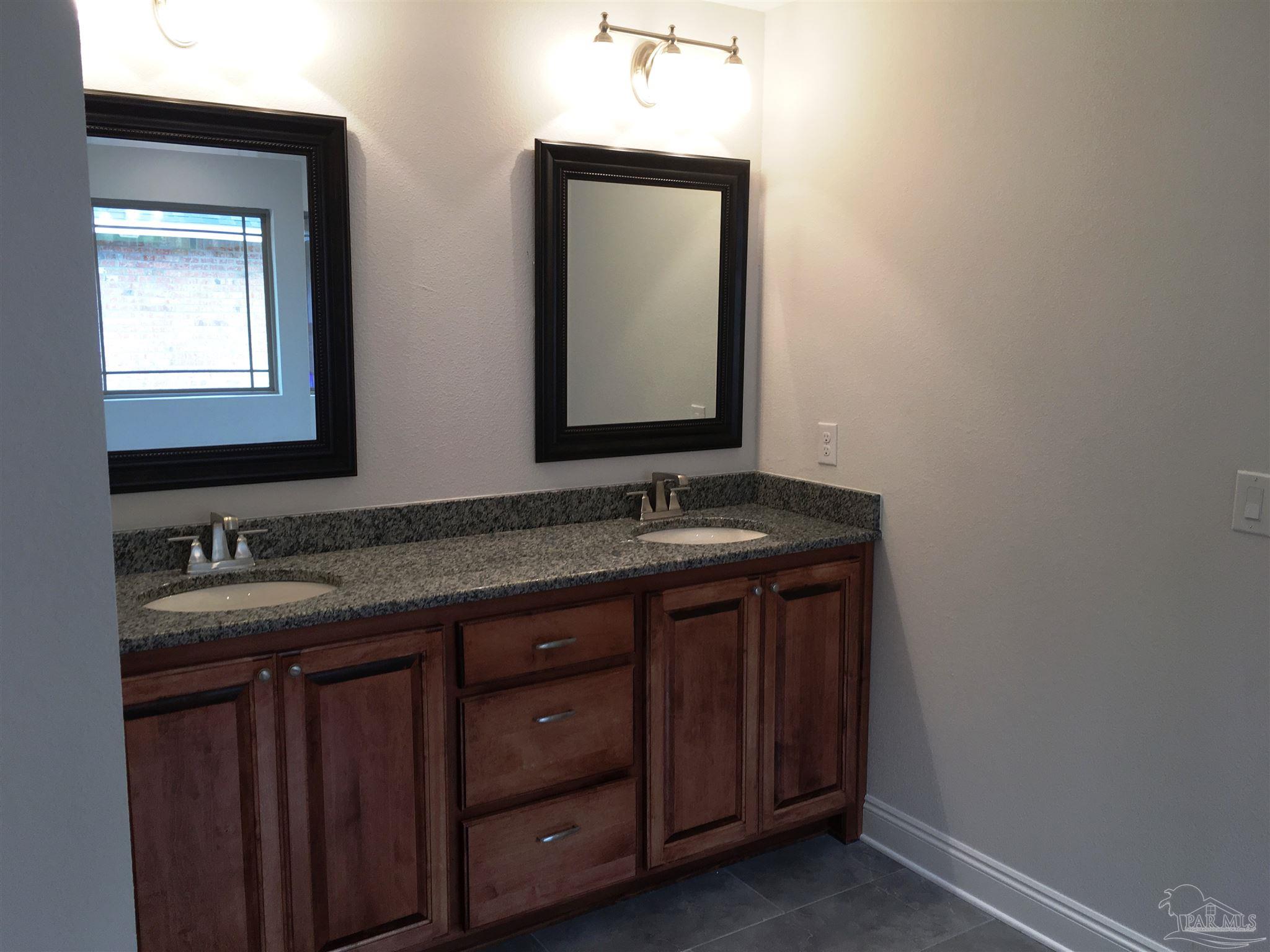 5436 South A Jones Road Milton, FL 32583 - Photo 24 of 34 Master bath features a dual sink vanity top.