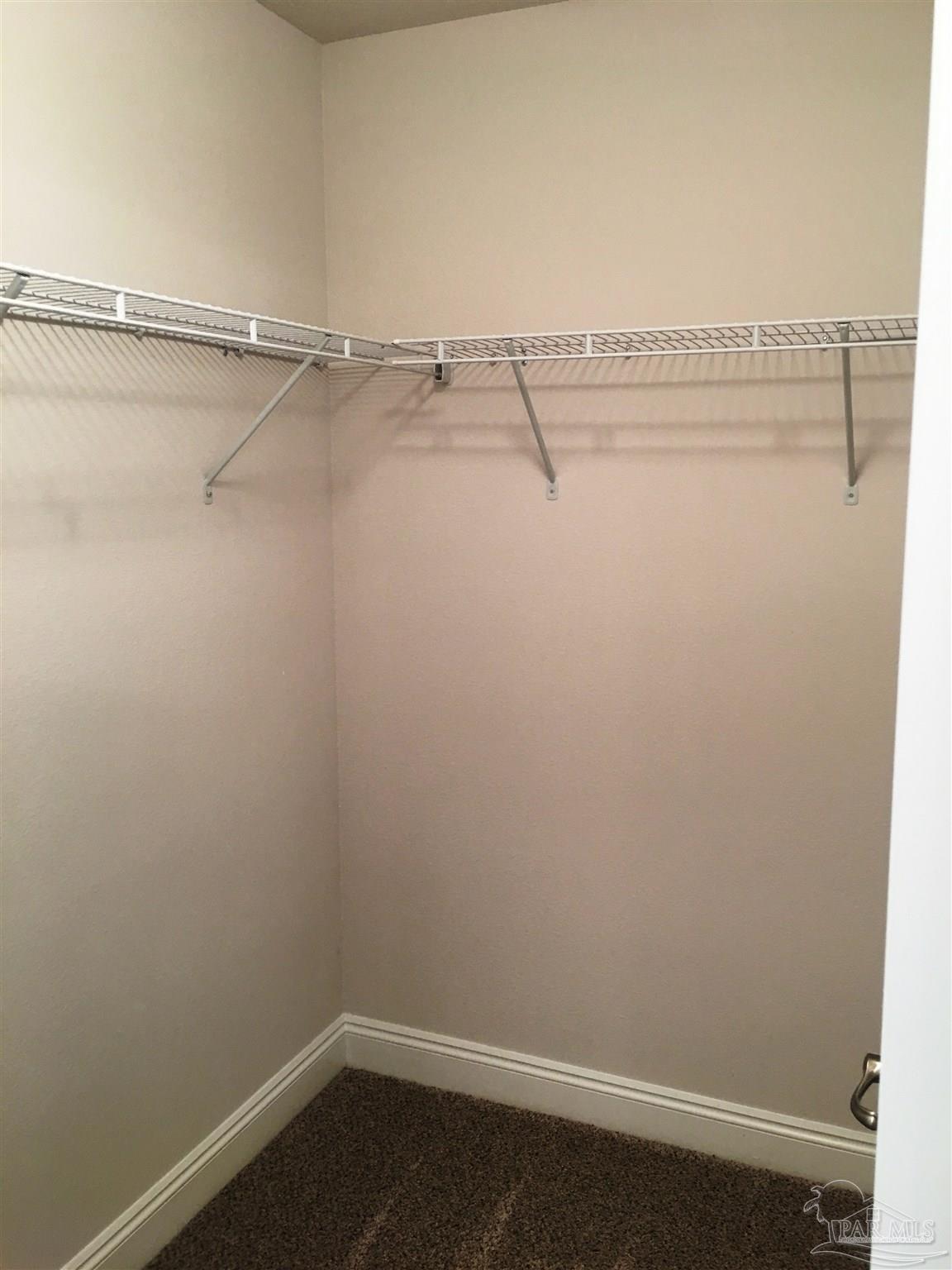 5436 South A Jones Road Milton, FL 32583 - Photo 25 of 34 Here's a view of master bath walk-in closet #1.