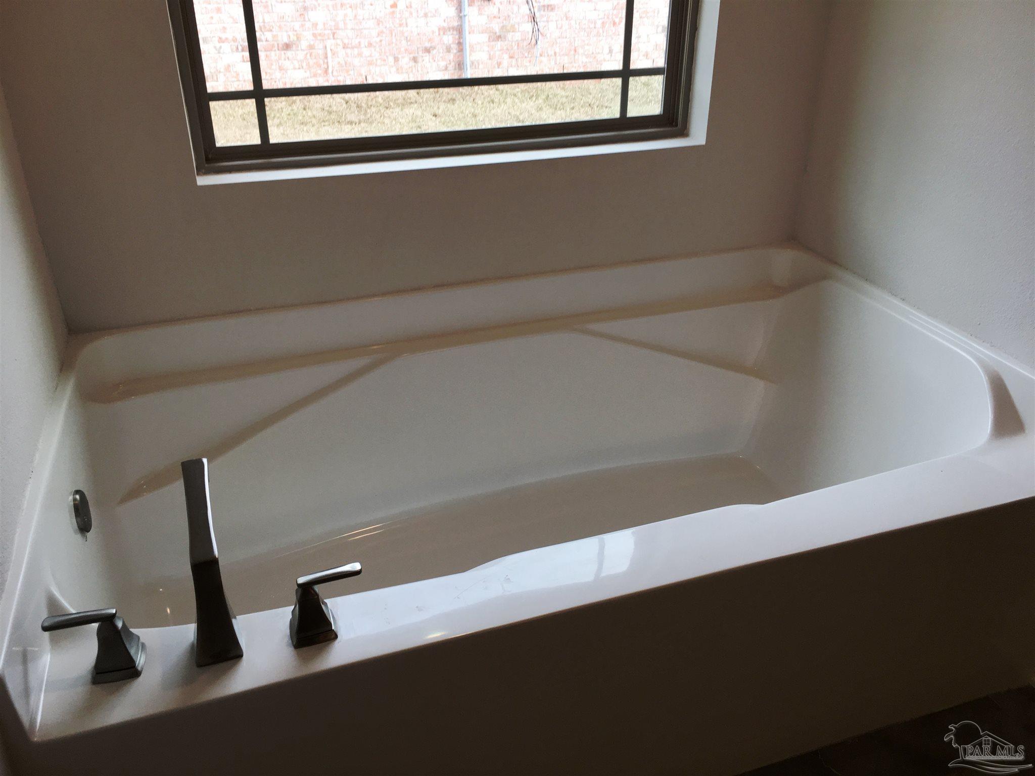 5436 South A Jones Road Milton, FL 32583 - Photo 26 of 34 Relax & unwind in the master bathtub.