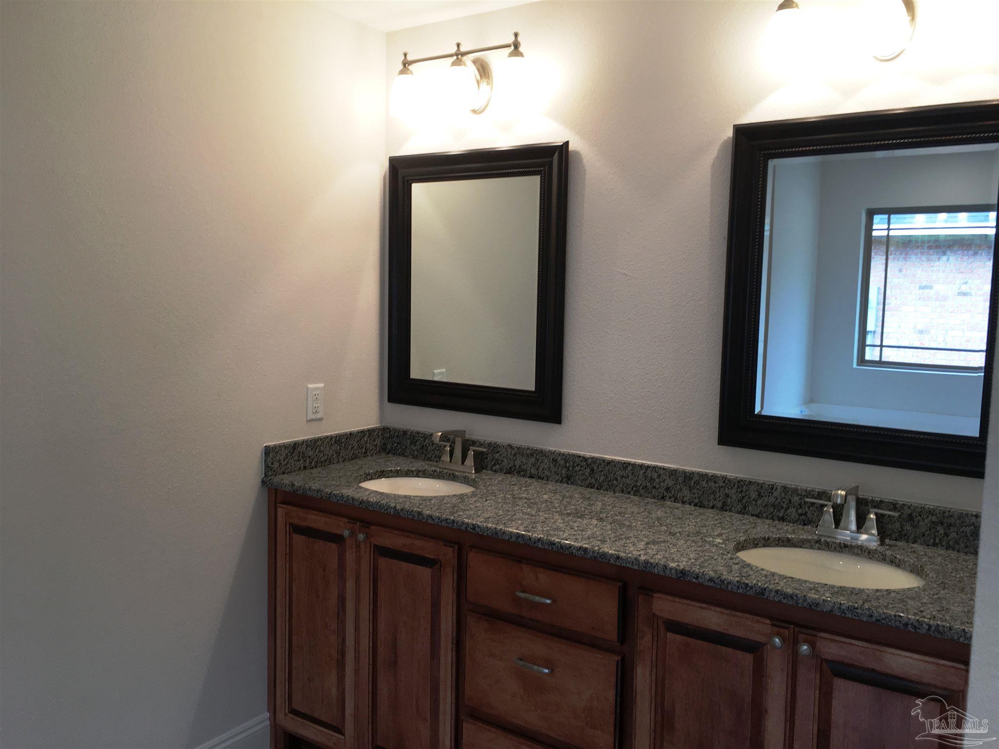 5436 South A Jones Road Milton, FL 32583 - Photo 29 of 34 Custom cabinets throughout are stunning.