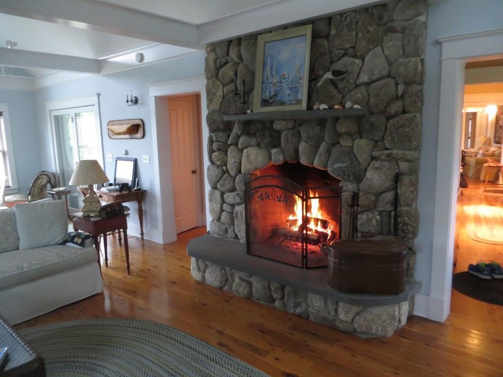 8 Tukey Lane Chamberlain, ME 04541 - Photo 13 of 20 The great room fireplace ... stone...
