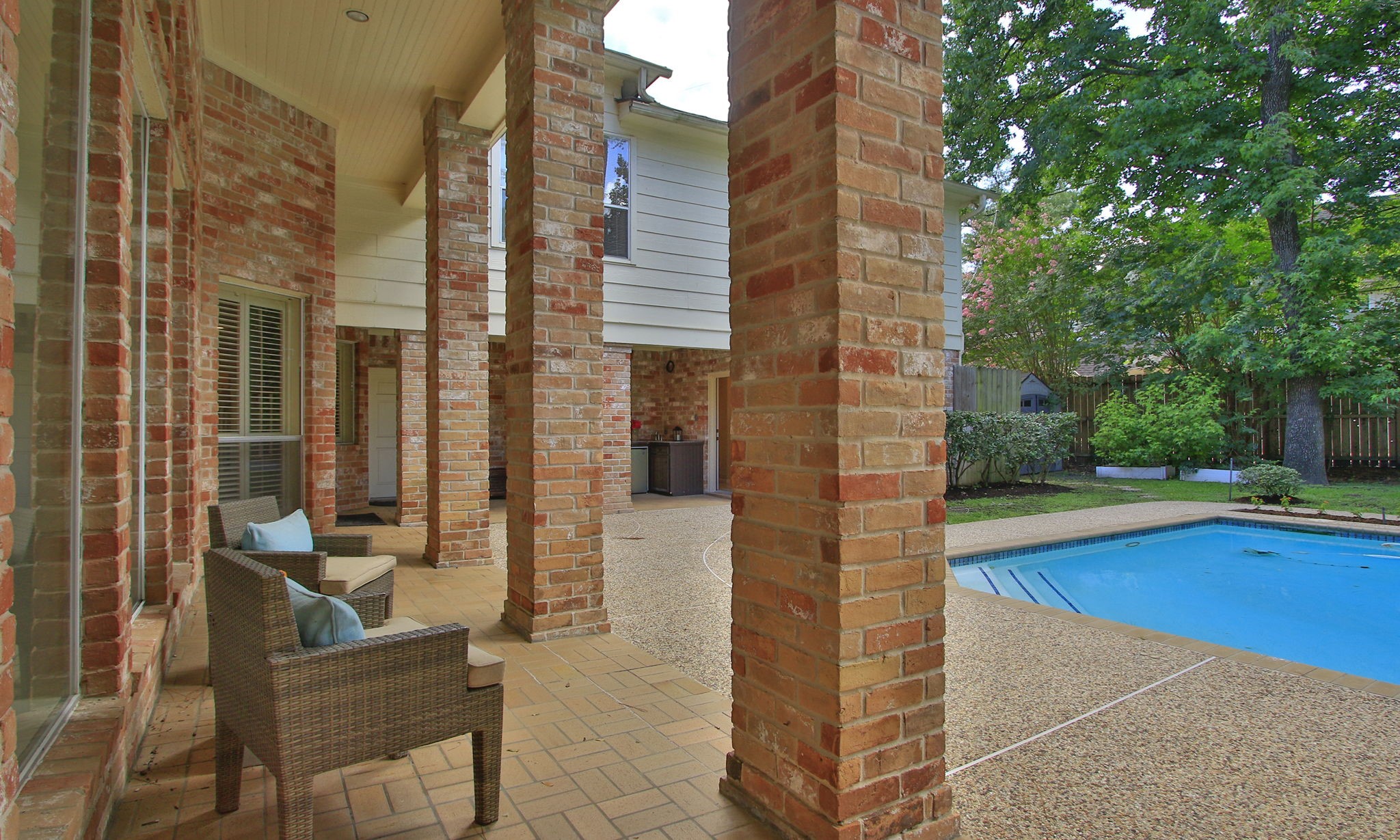 15923 Harwick Drive Spring, TX 77379 - Photo 47 of 50 The second covered patio is visible from the formal living area and has anice view of the backyard.