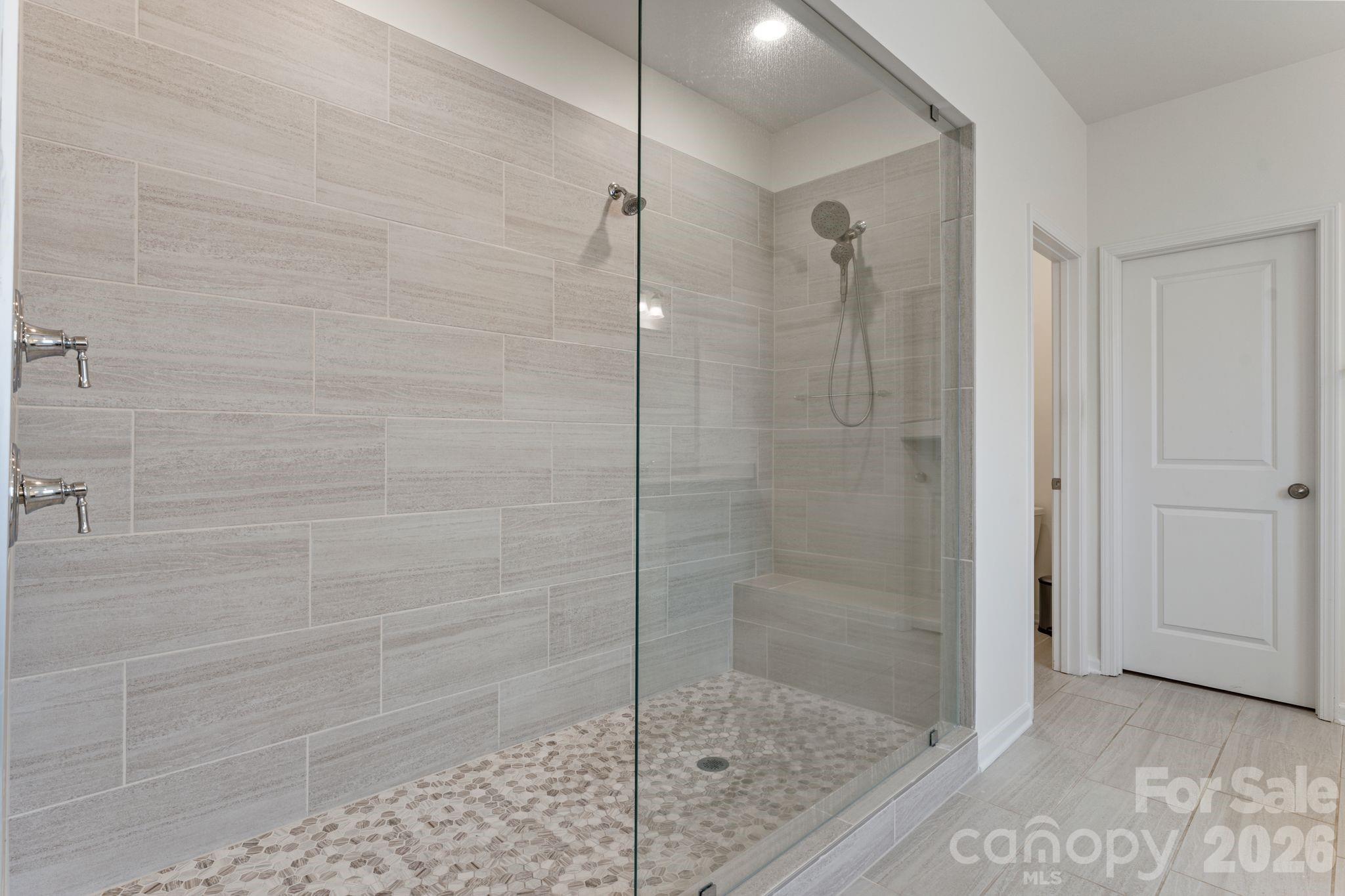 9786 Verdun Court Fort Mill, SC 29707 - Photo 19 of 41 a bathroom with a shower