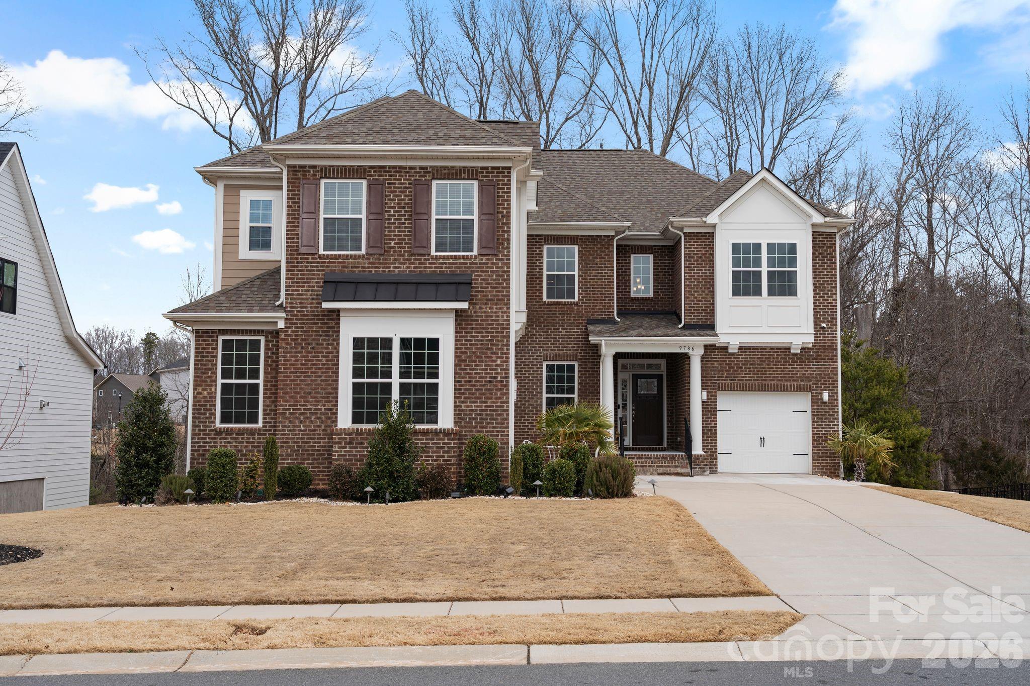 9786 Verdun Court Fort Mill, SC 29707 - Photo 2 of 41 a front view of a house with yard and trees