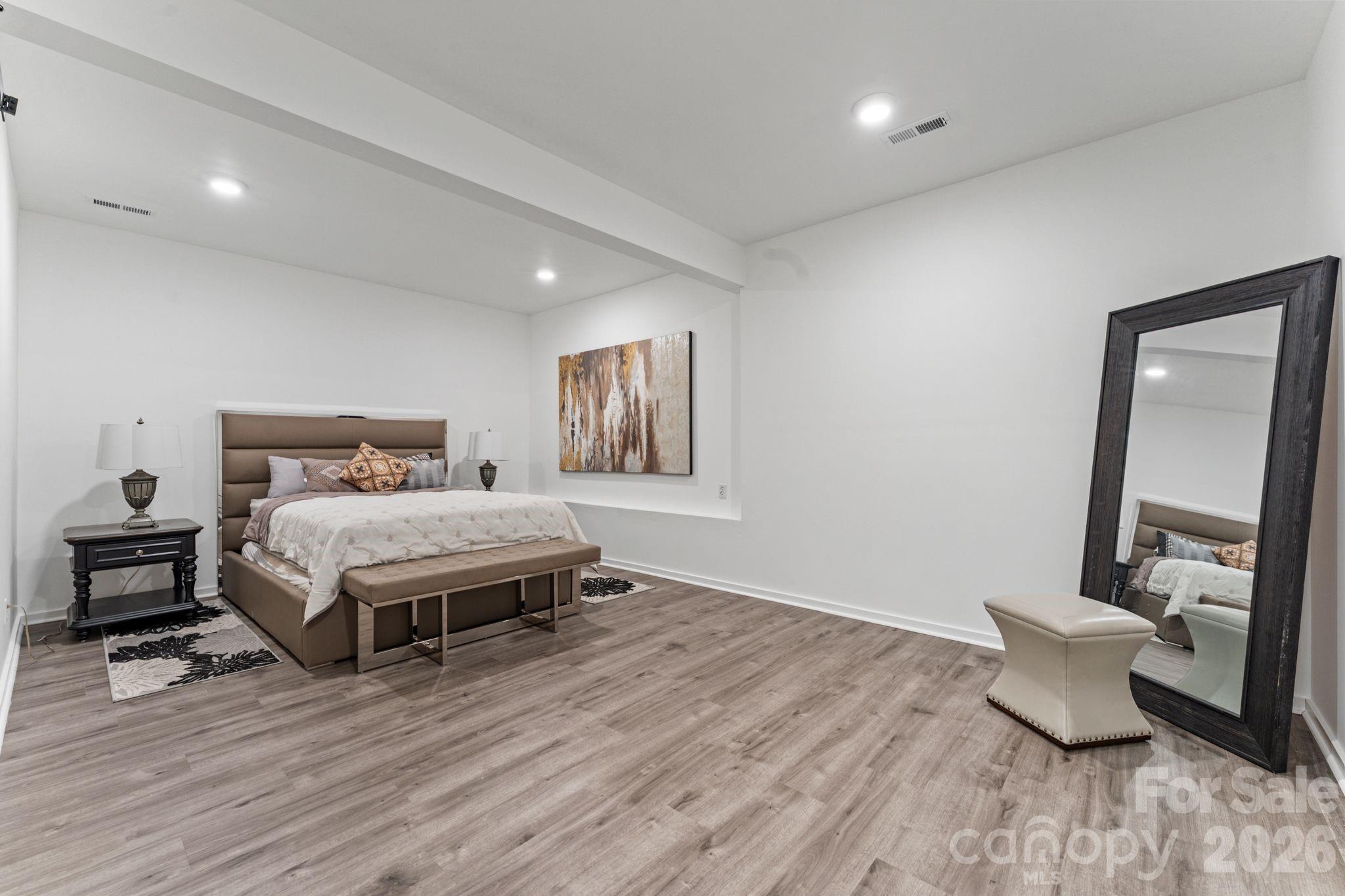 9786 Verdun Court Fort Mill, SC 29707 - Photo 30 of 41 a bed room with a bed and a chair