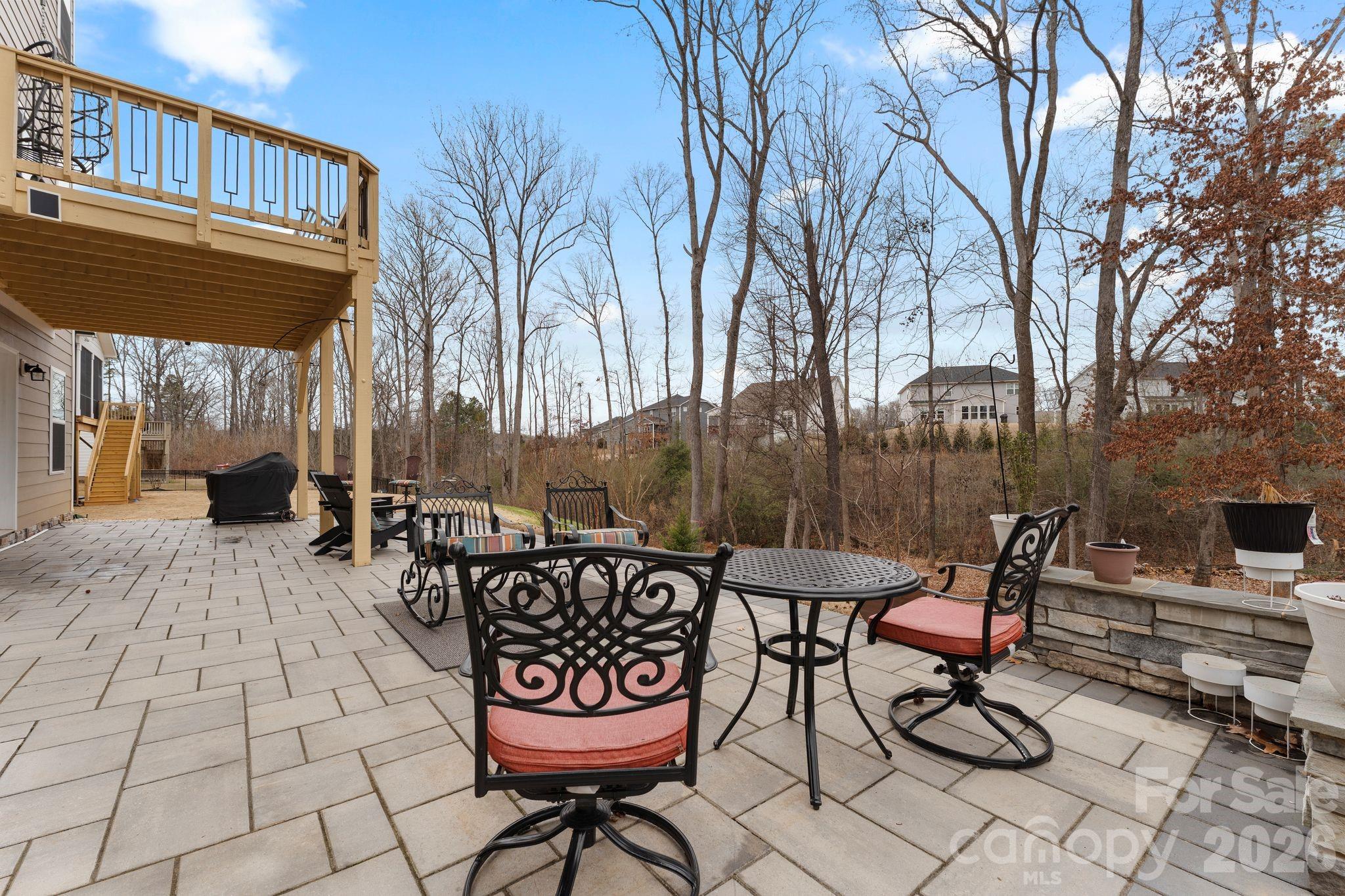 9786 Verdun Court Fort Mill, SC 29707 - Photo 33 of 41 a view of a chairs and tables in the patio in front of house