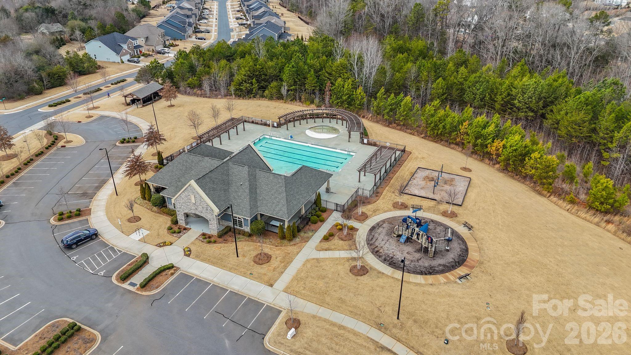 9786 Verdun Court Fort Mill, SC 29707 - Photo 39 of 41 an aerial view of a swimming pool with outdoor seating