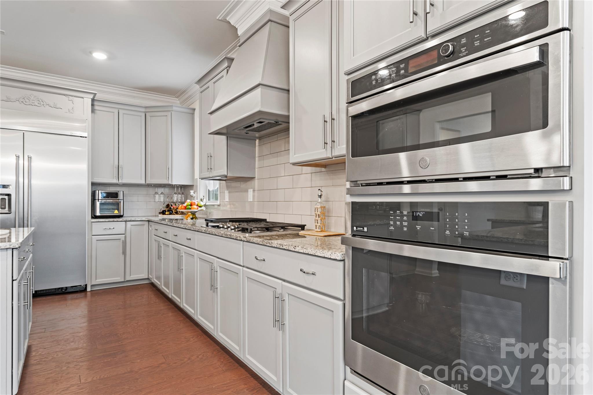 9786 Verdun Court Fort Mill, SC 29707 - Photo 10 of 41 a kitchen with stainless steel appliances and cabinets
