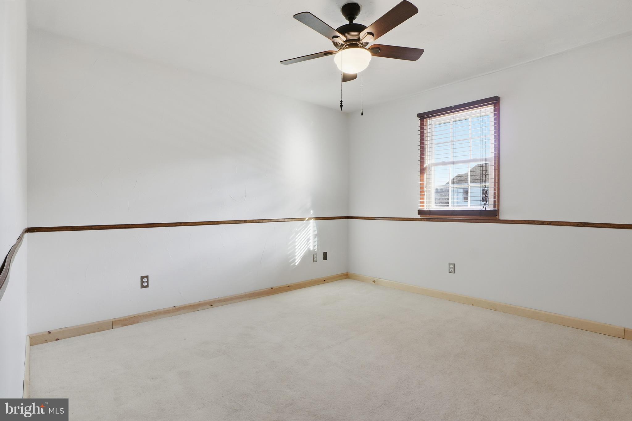 1330 Goodyear Road Gardners, PA 17324 - Photo 13 of 72 an empty room with a window and a ceiling fan