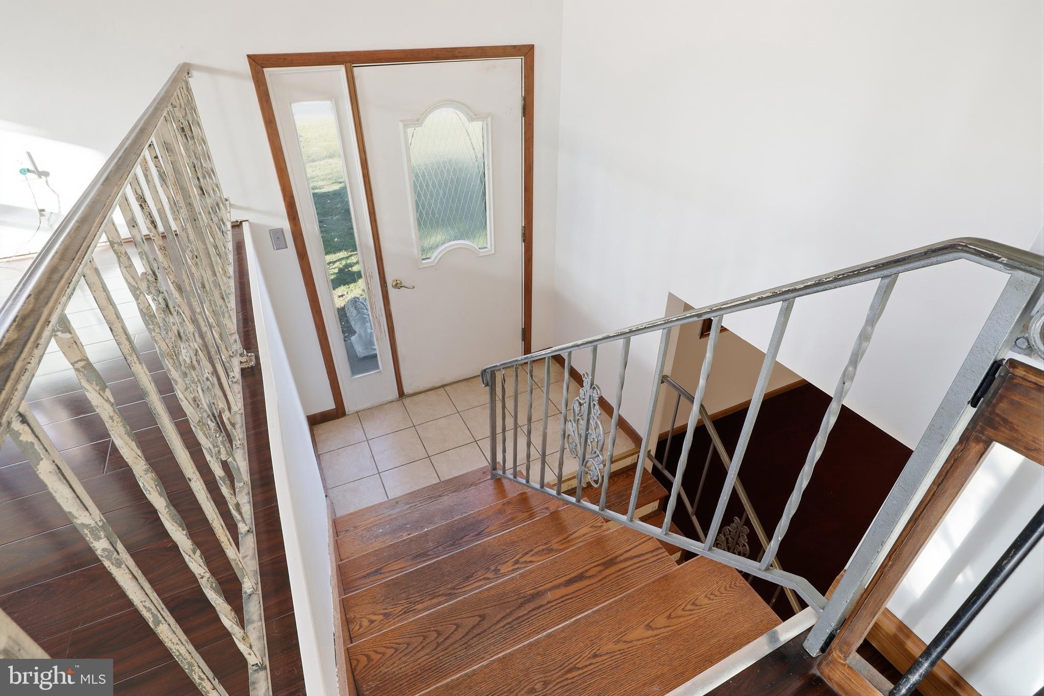 1330 Goodyear Road Gardners, PA 17324 - Photo 24 of 72 a view of staircase with wooden floor and white walls