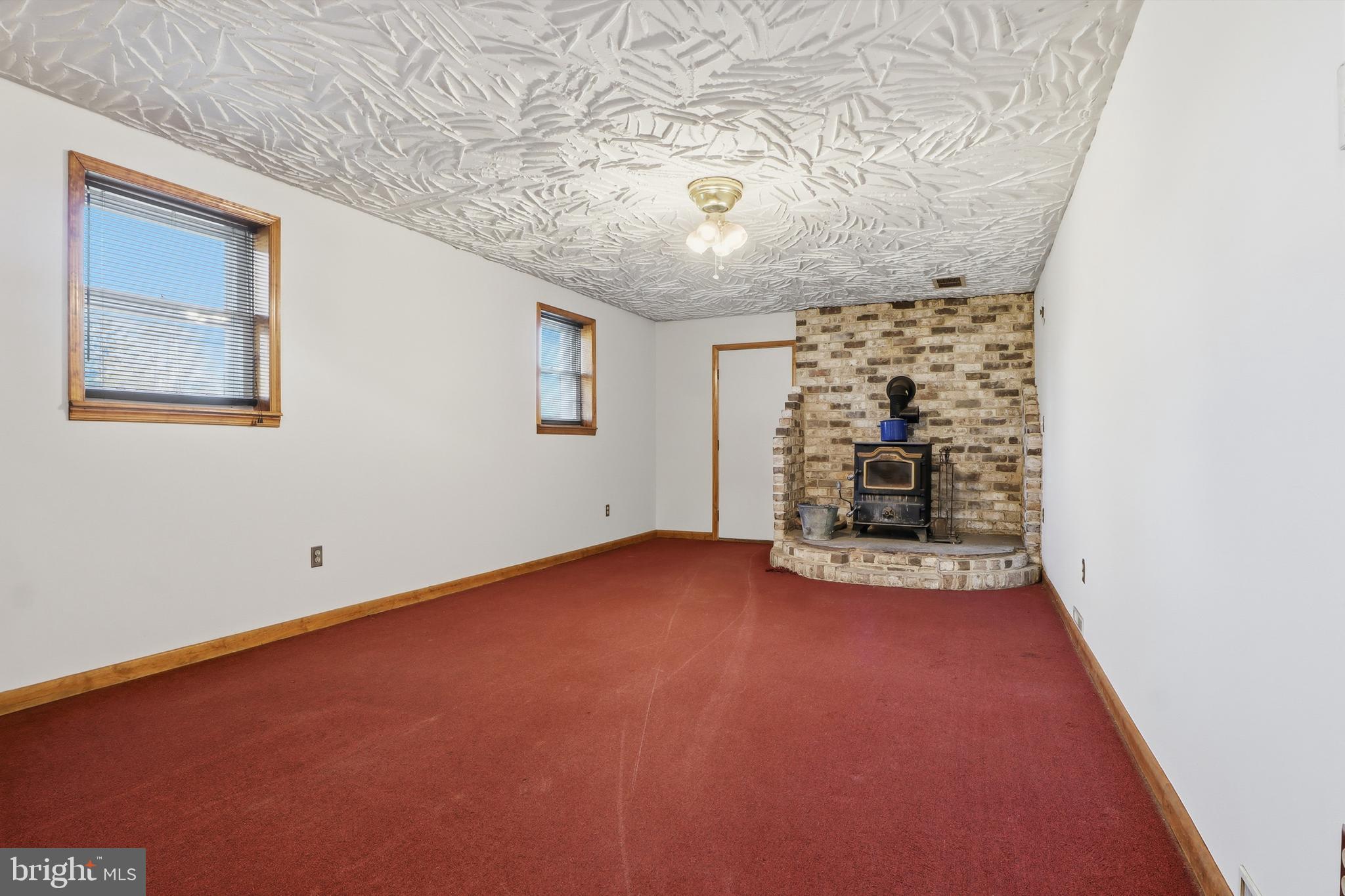 1330 Goodyear Road Gardners, PA 17324 - Photo 25 of 72 an empty room with a fireplace and painted walls