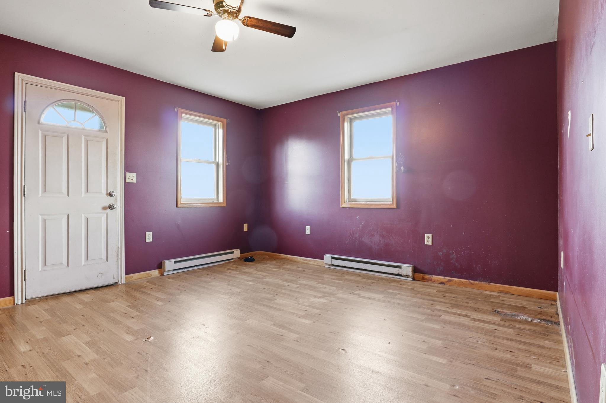 1330 Goodyear Road Gardners, PA 17324 - Photo 51 of 72 an empty room with windows and ceiling fan