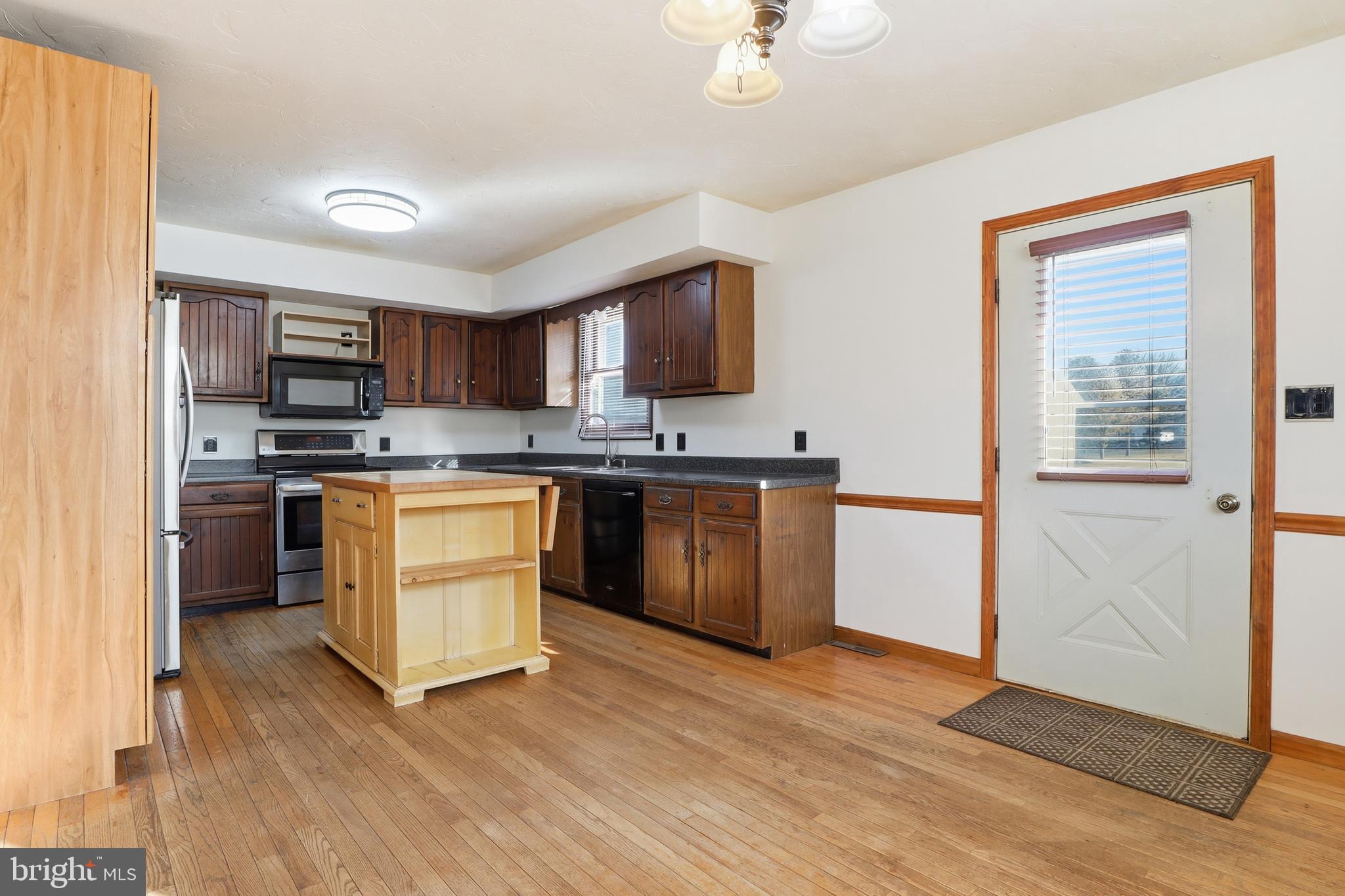 1330 Goodyear Road Gardners, PA 17324 - Photo 7 of 72 a kitchen with stainless steel appliances granite countertop a stove top oven a sink dishwasher and a refrigerator