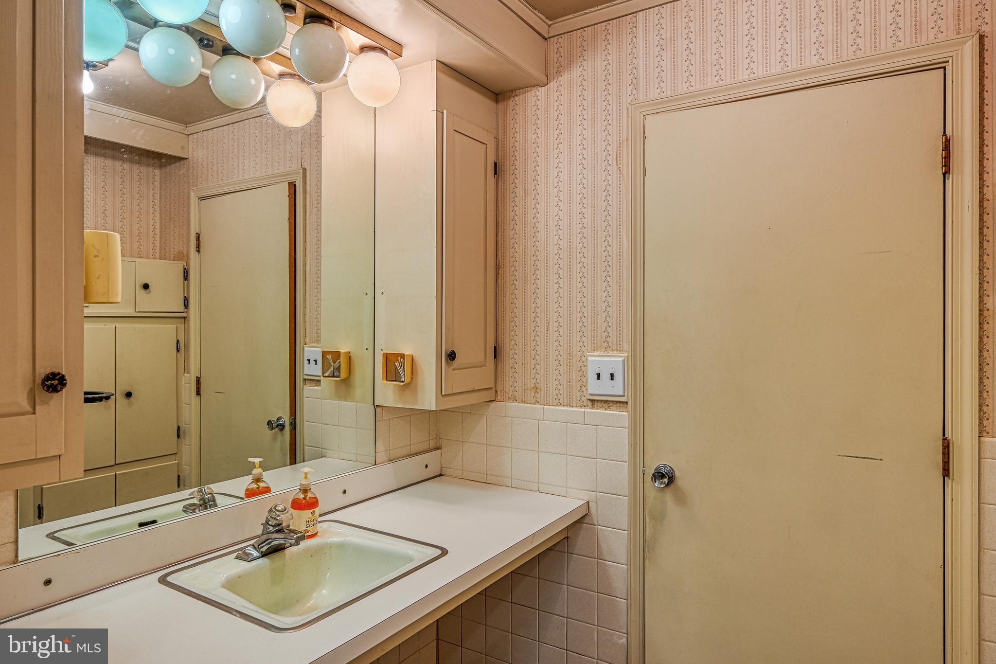 517 Doctors Road Louisa, VA 23093 - Photo 24 of 83 a bathroom with a sink and a mirror
