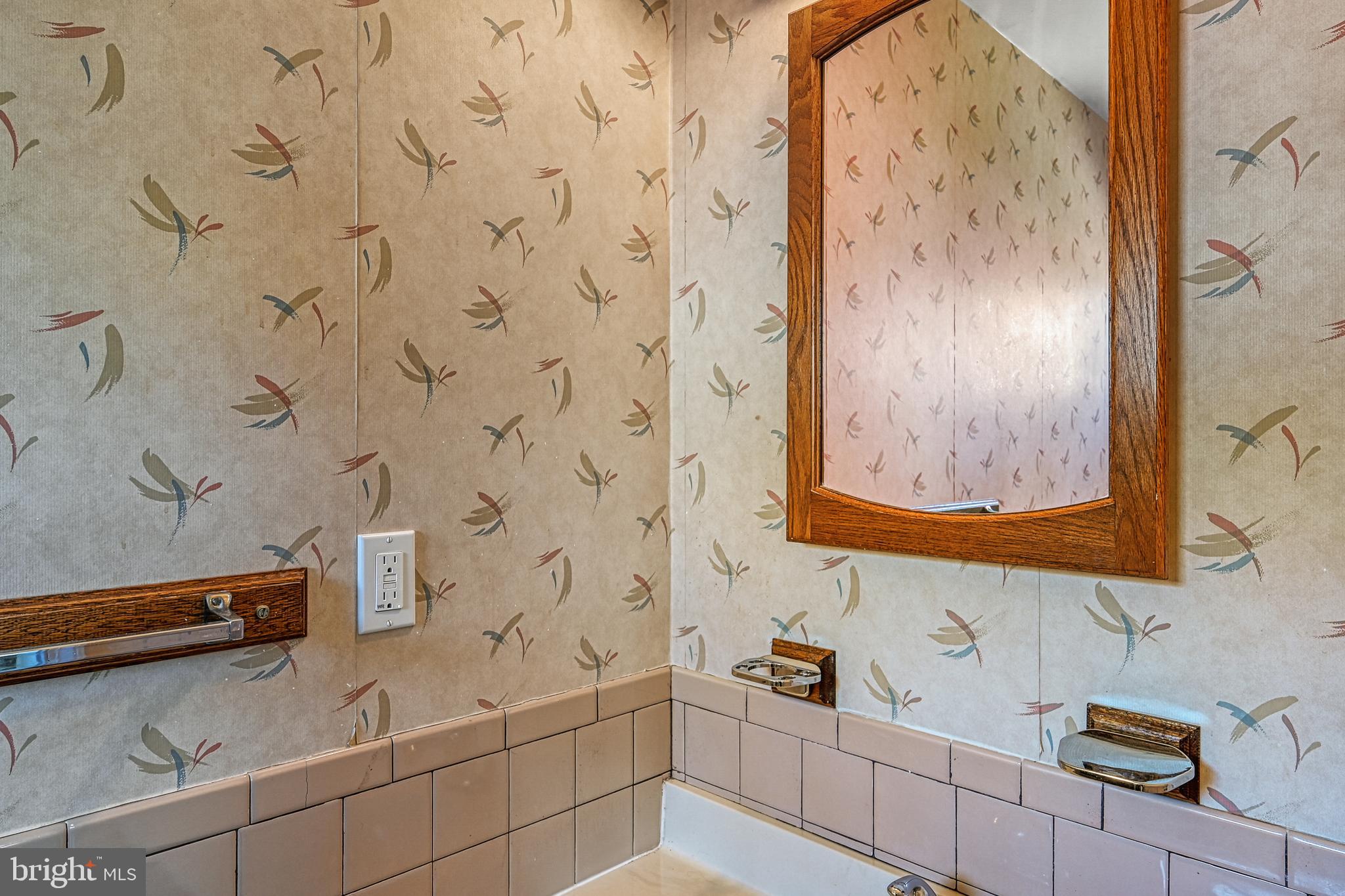 517 Doctors Road Louisa, VA 23093 - Photo 34 of 83 a bathroom with a bathtub sink and mirror