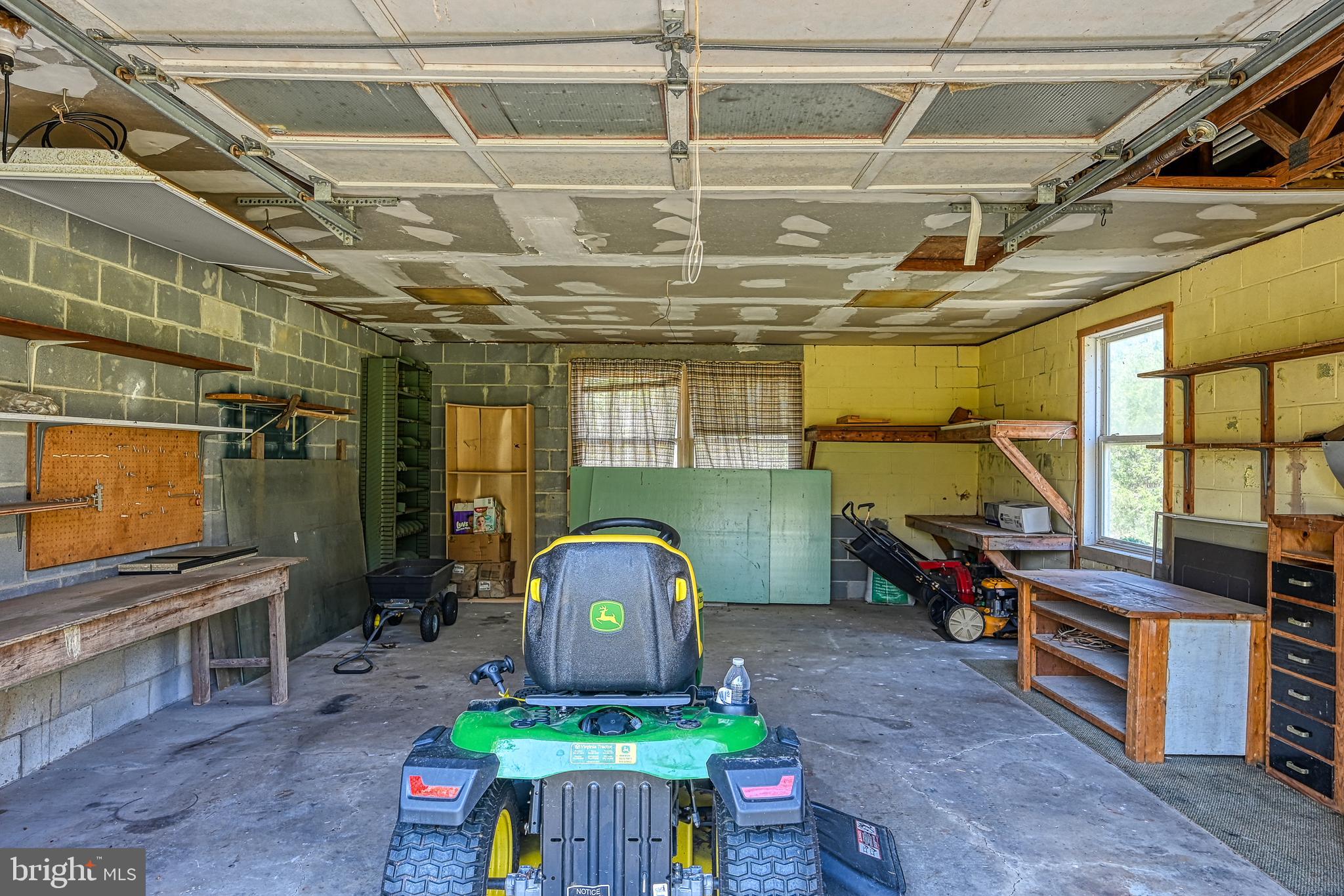 517 Doctors Road Louisa, VA 23093 - Photo 40 of 83 a room with lots of furniture and appliances