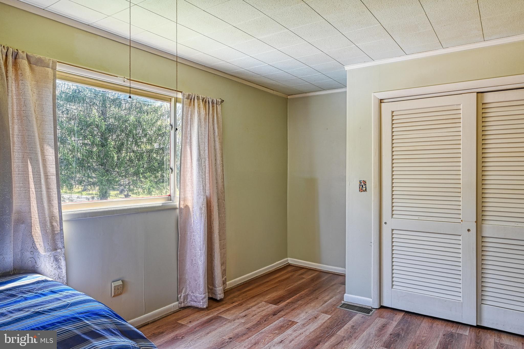 517 Doctors Road Louisa, VA 23093 - Photo 51 of 83 a view of room with window and wooden floor