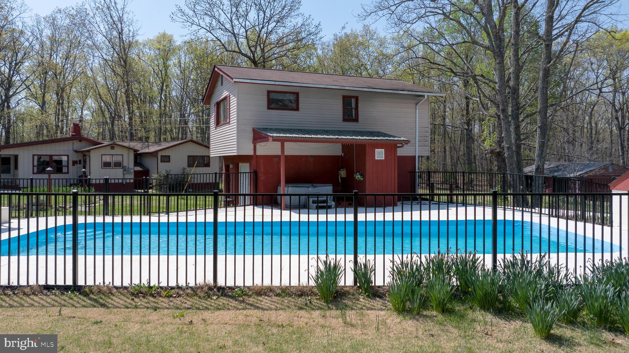 517 Doctors Road Louisa, VA 23093 - Photo 56 of 83 a view of a house with a small yard and plants