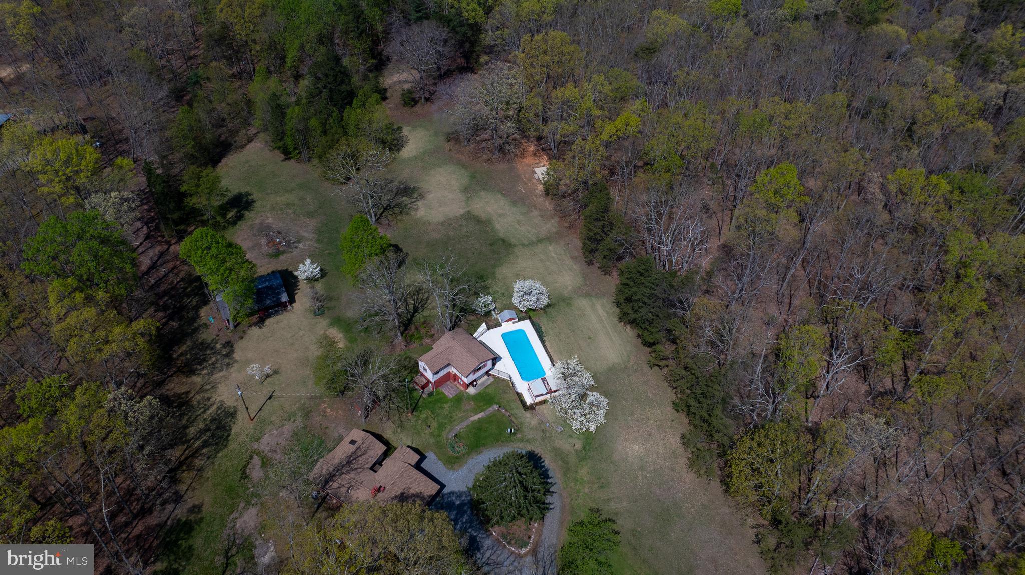 517 Doctors Road Louisa, VA 23093 - Photo 81 of 83 an aerial view of a house with a yard and swimming pool