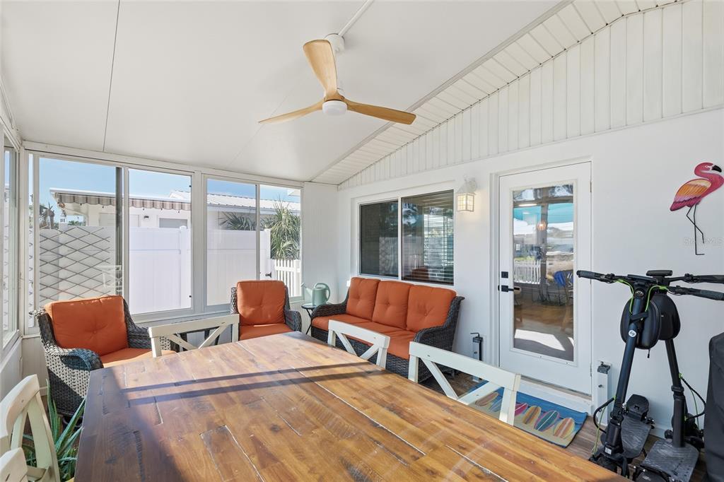 417 63rd Street Holmes Beach, FL 34217 - Photo 19 of 48 a room with furniture and a window