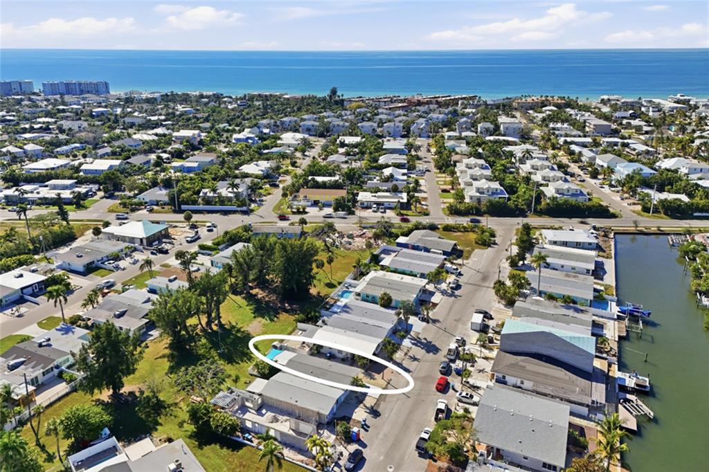 417 63rd Street Holmes Beach, FL 34217 - Photo 24 of 48 an aerial view of multiple house