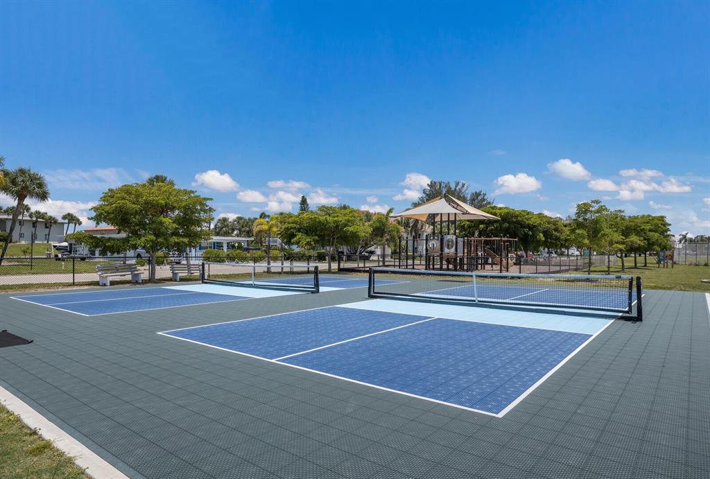 417 63rd Street Holmes Beach, FL 34217 - Photo 46 of 48 a view of a tennis court