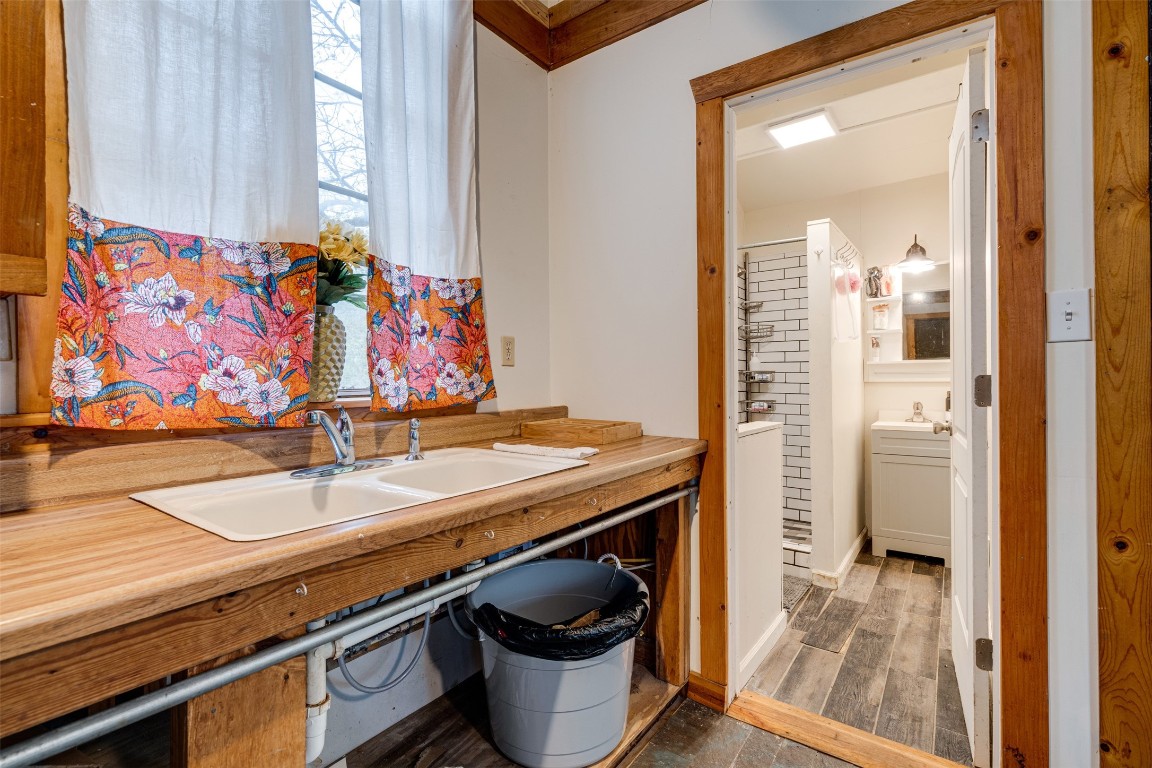 112 Boulder Lane Manor, TX 78653 - Photo 25 of 39 a bathroom with a sink and a mirror