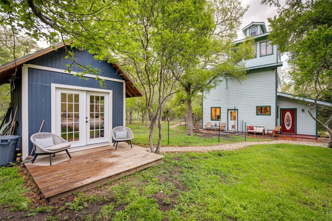 112 Boulder Lane Manor, TX 78653 - Photo 33 of 39 a house view with a sitting space and garden