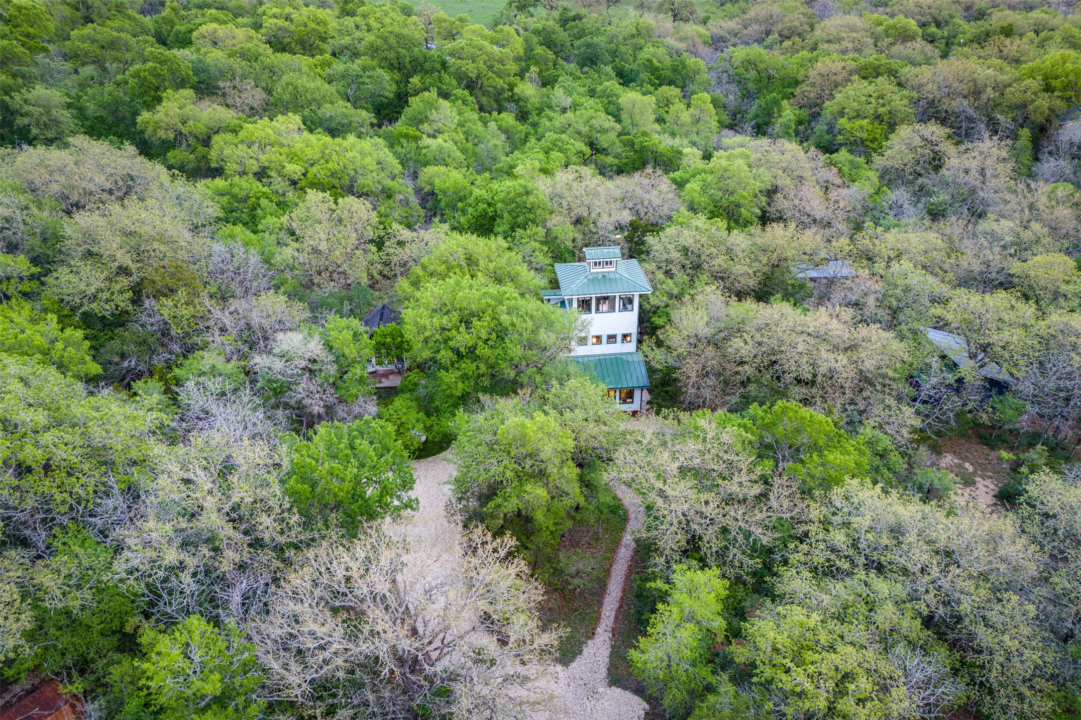 112 Boulder Lane Manor, TX 78653 - Photo 38 of 39 an aerial view of a house with a yard