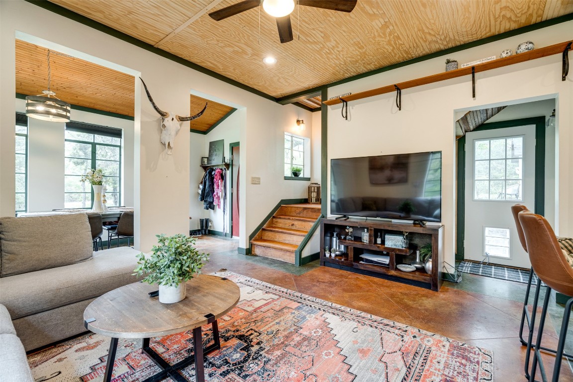 112 Boulder Lane Manor, TX 78653 - Photo 6 of 39 a living room with furniture and a flat screen tv