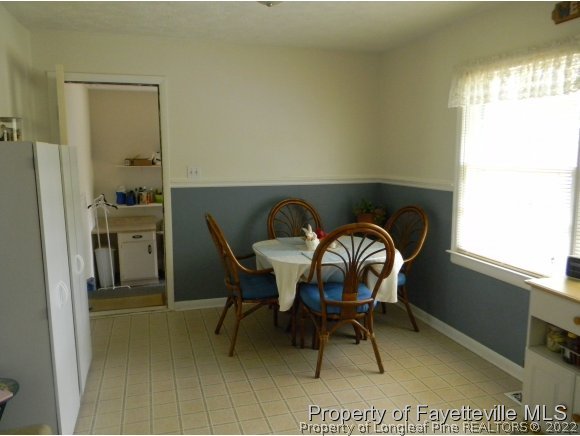 638 Azalea Drive Spring Lake, NC 28390 - Photo 5 of 14 a dining room with furniture and window
