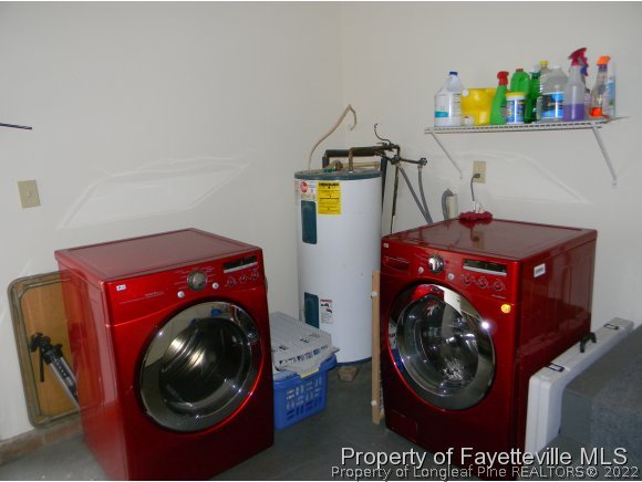 638 Azalea Drive Spring Lake, NC 28390 - Photo 10 of 14 a utility room with dryer and washer