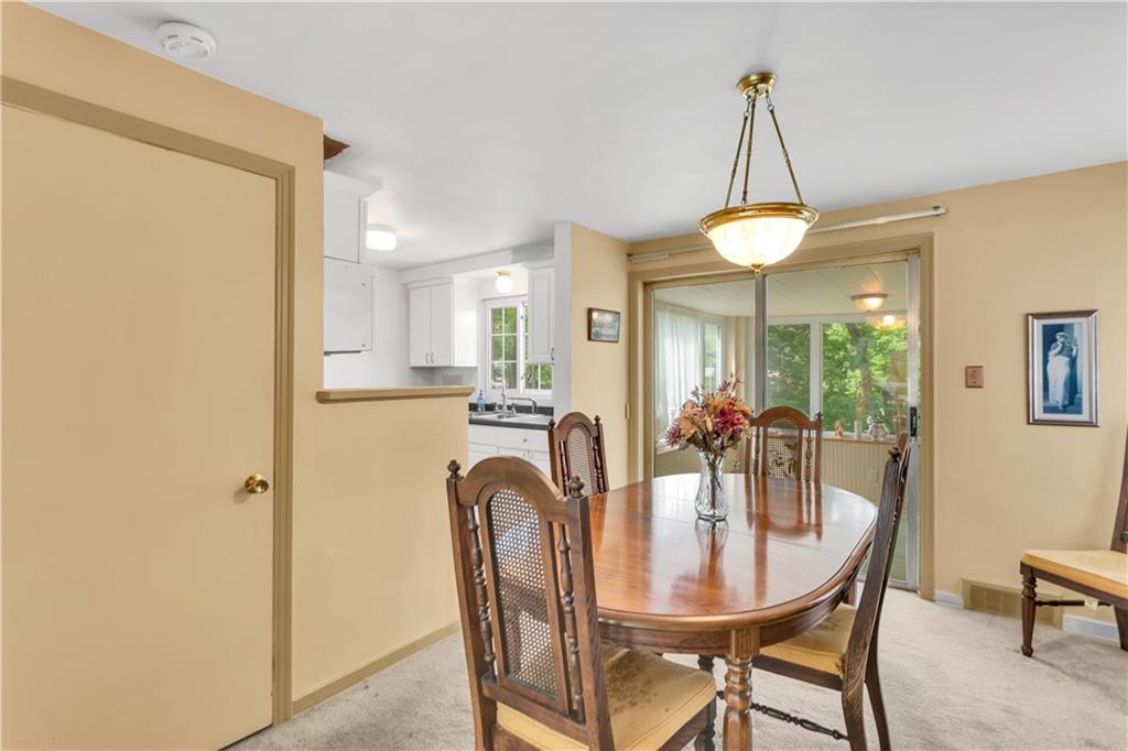 122 Spring Grove Road Pittsburgh, PA 15235 - Photo 13 of 25 Dining room leads to sun room