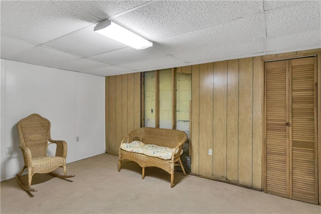 122 Spring Grove Road Pittsburgh, PA 15235 - Photo 24 of 25 Game room area with some paneling removed in order to see behind it