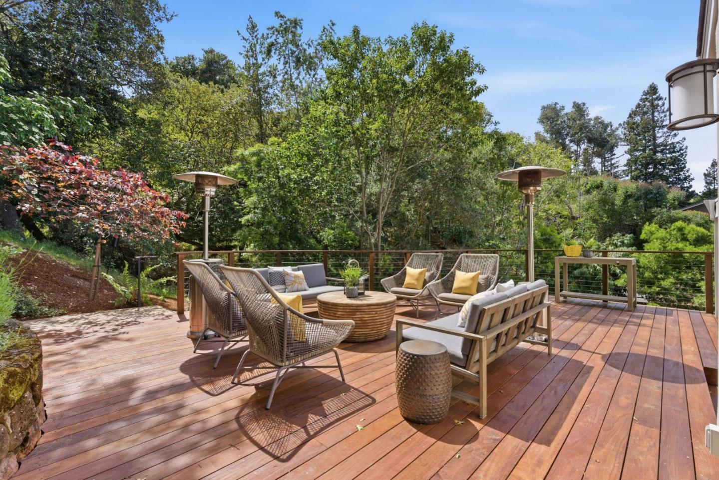 2884 Roland Avenue San Carlos, CA 94070 - Photo 4 of 27 a view of a roof deck with table and chairs and wooden floor